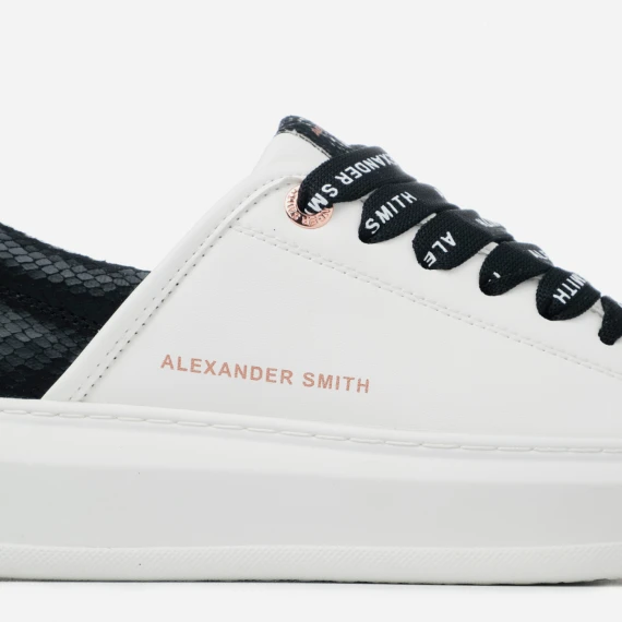 Sneakers vegana bianca con sperone e linguella in stampato pitone nero
