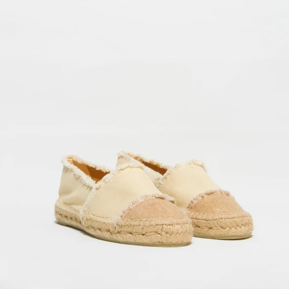 Espadrilla piatta in tela di cotone avorio. Design con finitura sfrangiata