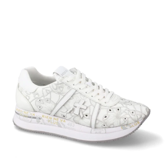 Sneakers Conny in pelle bianca laserata con ricami fiorati in tono